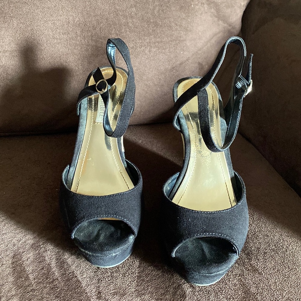 Black and gold wedges by Jennifer Lopez size 6